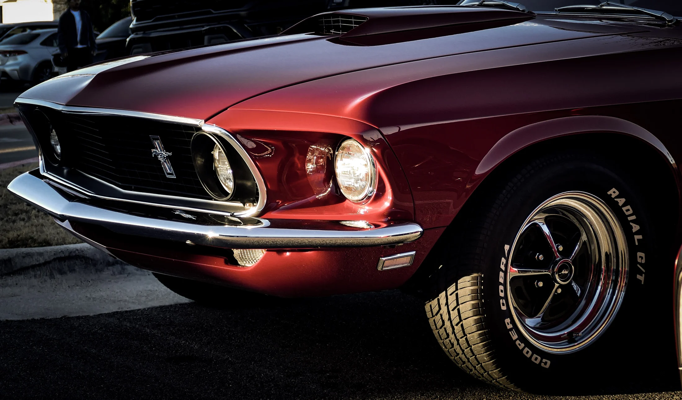 Classic red Ford Mustang in sunlight