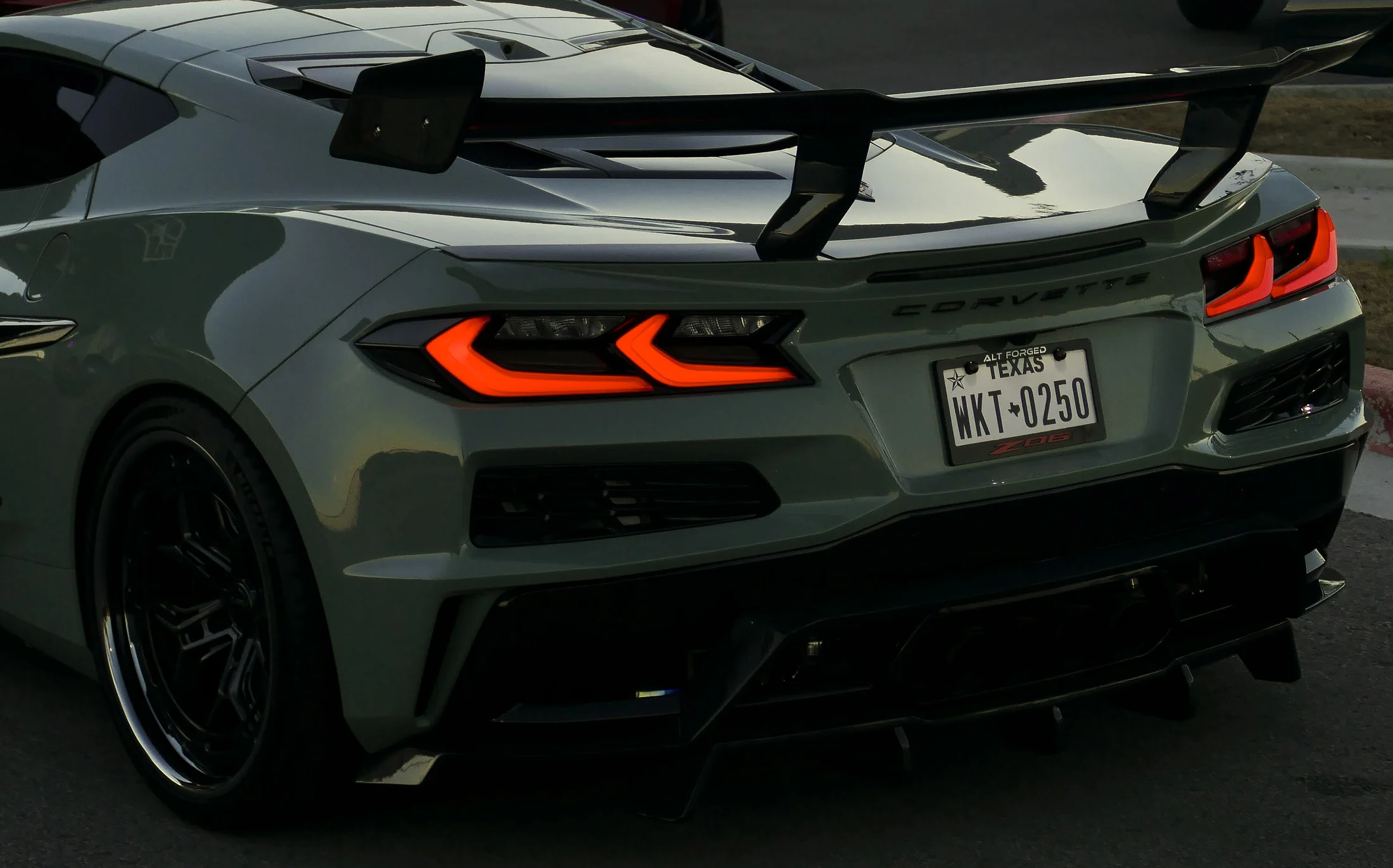 Gray Corvette photographed from the rear